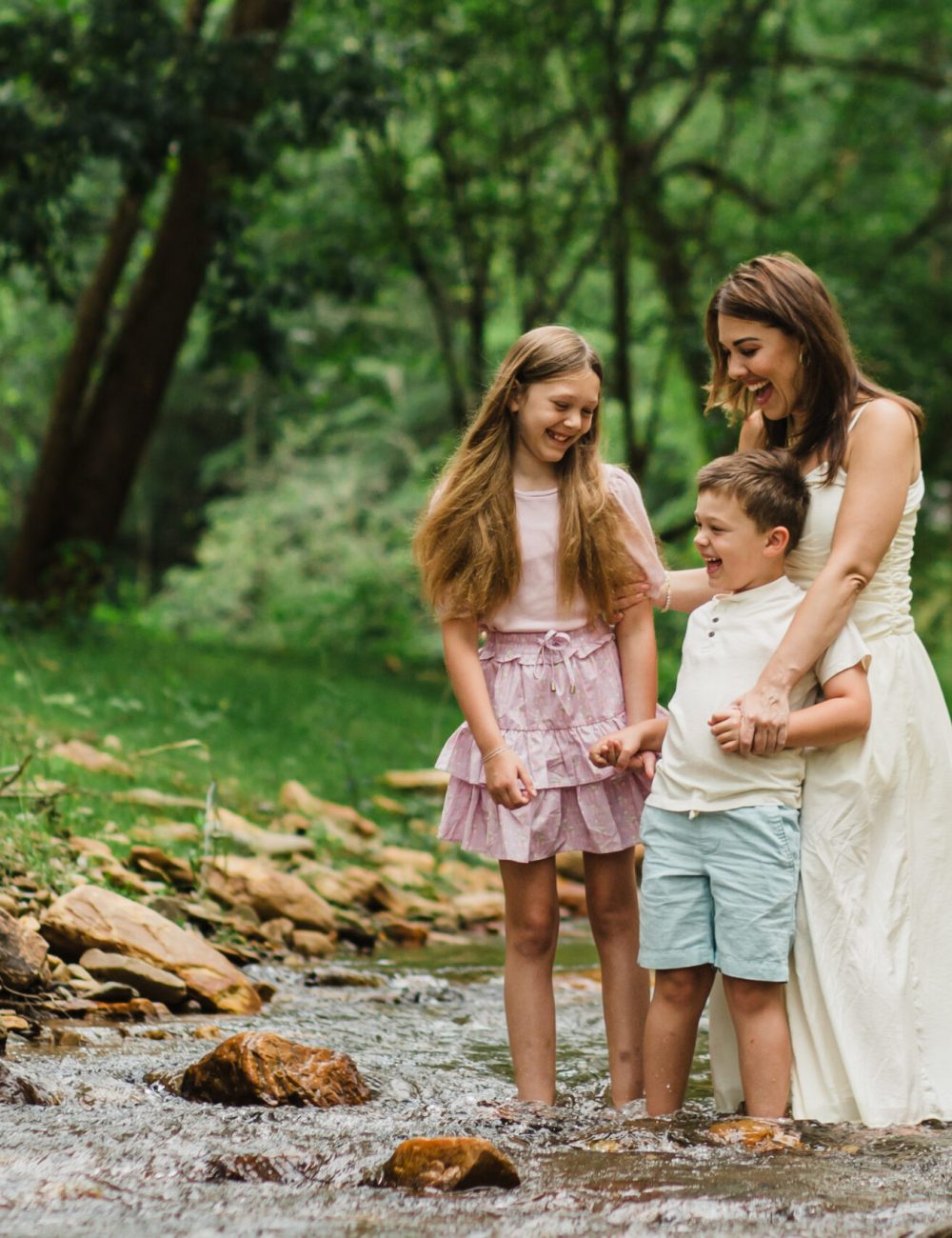 Asheville NC photographer laughing with her children